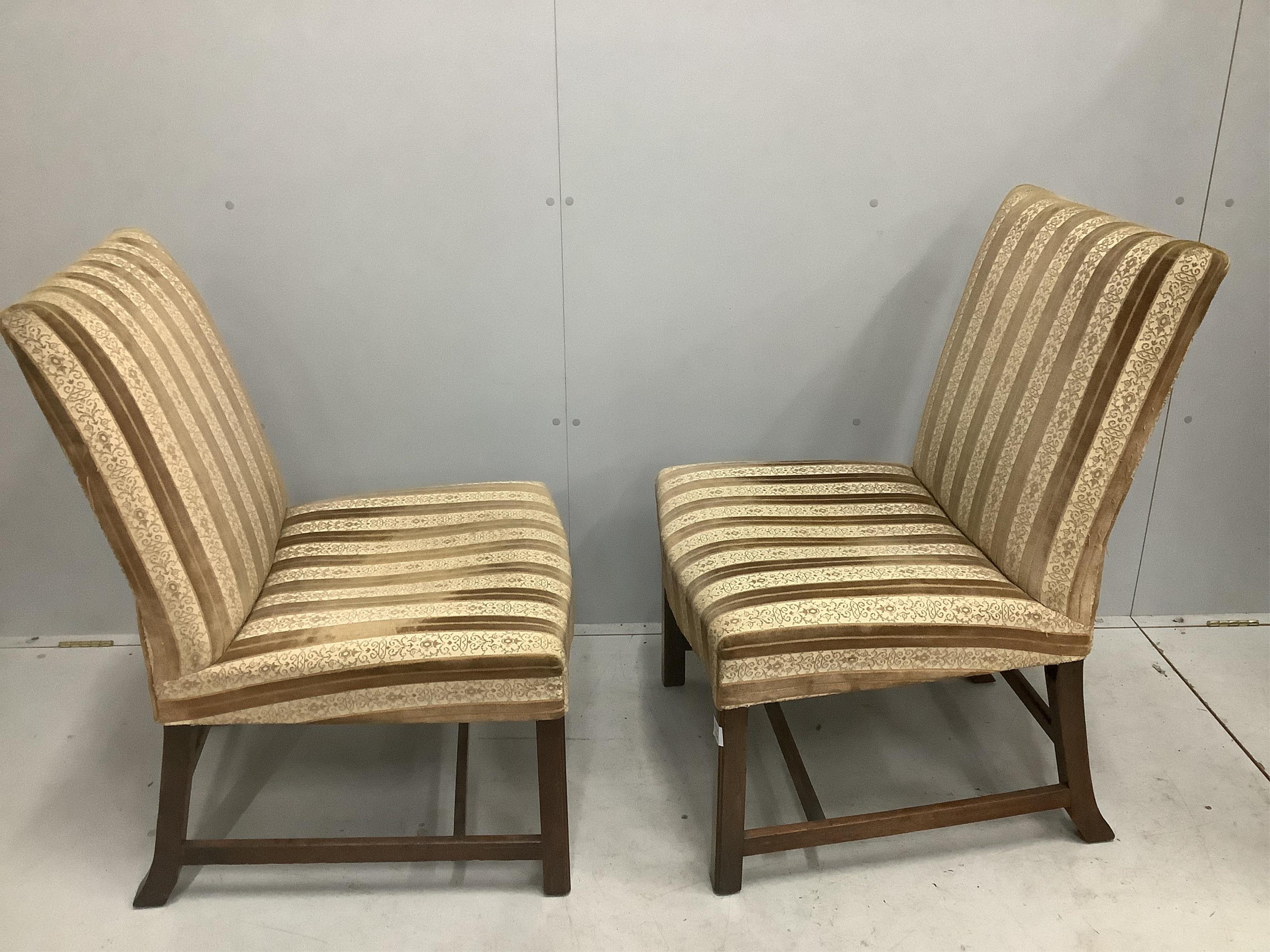 A pair of George III style upholstered mahogany side chairs, width 50cm, depth 56cm, height 94cm. Condition - fair